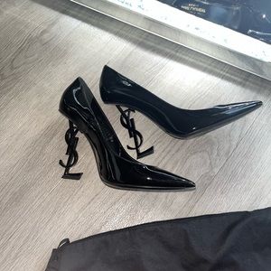 Black patent leather YSL pumps